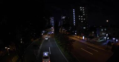 A night traffic jam at the city crossing in Tokyo wide shot video