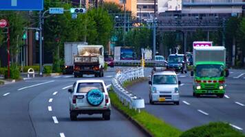 un lapso de tiempo de el tráfico mermelada a el urbano calle en tokio largo Disparo enfocar video