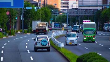 A timelapse of the traffic jam at the urban street in Tokyo long shot zoom video