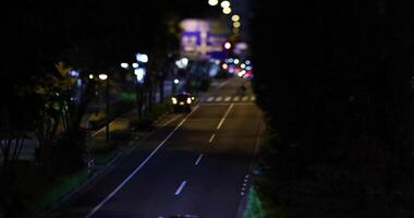 A night miniature traffic jam at the city crossing in Tokyo video