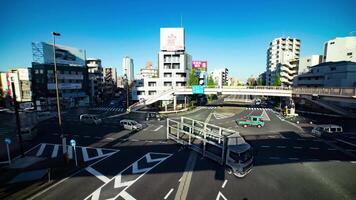 un lapso de tiempo de el tráfico mermelada a el cruce en tokio amplio Disparo video