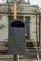 Berlin, Germany - March, 3rd, 2024. Garbage can with Anti Putin text on the day of demonstration in front of Russian Embassy on the President Election Day in Russian Federation. Noon against putin photo