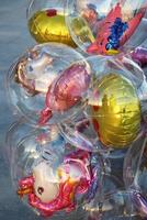 Durres, Albania. September 3, 2022. Detail of balloons of popular cartoons, which are sold to children at the Adriatic sea beach. Selective focus photo