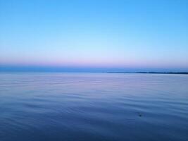 quiet blue sea and sky photo