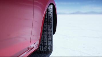 red sport car on the salt lake video