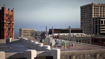 the rooftops of its tallest buildings during a vibrant sunset video