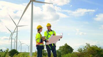 people engineer are wearing a protective helmet on head, using tablet Analytics engineering data video