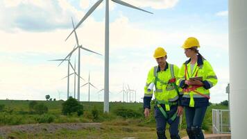 people engineer are wearing a protective helmet on head, using tablet Analytics engineering data video