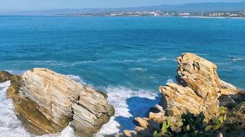 Beautiful rocks cliffs view waves at beach coast panorama Mexico. video