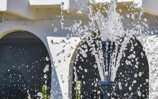 Elegant marble fountain in the front garden Puerto Escondido Mexico. photo