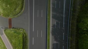 Aerial footage rising above highway top-down view video