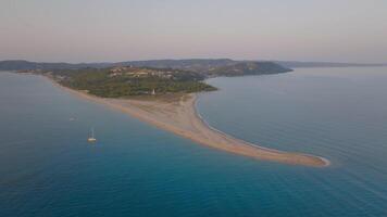 Aerial cinematic motion towards Possidi Cape sandy beach Greece video