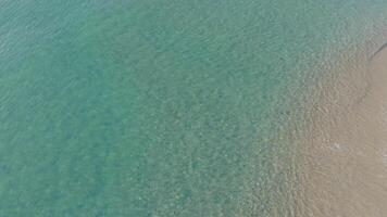 Aerial view of crystal-clear waters, ideal for serene backdrops video