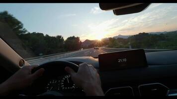 Driving at sunset with dashboard clock display video