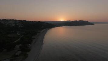 Aerial footage of coastal line at sunrise video