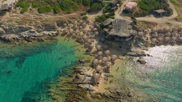 Cinematic drone orbit around a vibrant island cove video