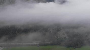 Aerial cinematic left to right drift over twilight highway in Dolomites Austria video