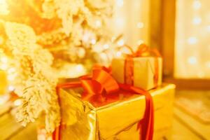 presents under Christmas tree, festive and celebratory atmosphere. photo