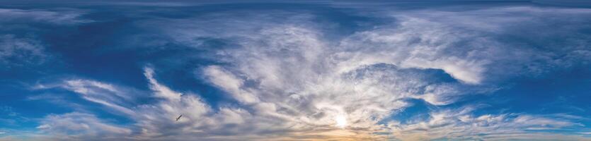 Sunset sky panorama with Cirrus clouds in Seamless spherical equirectangular format. Complete zenith for use in 3D graphics, game and for composites in aerial drone 360 degree panoramas as a sky dome photo