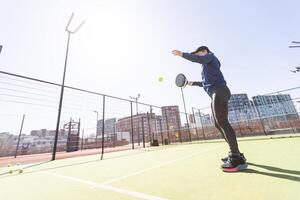 Paddle tennis woman image in court photo