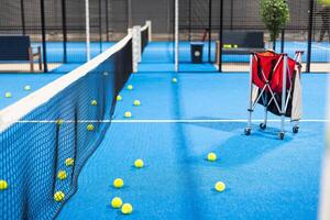 Tennis balls fall over on the tennis playground photo