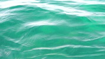 Sea water surface. Camera flies over the calm azure sea. Nobody. Holiday recreation concept. Abstract nautical summer ocean nature. Weather and climate change. Slow motion. Close up video