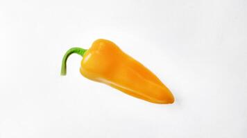 Fresh Yellow Bell Pepper on White Background photo