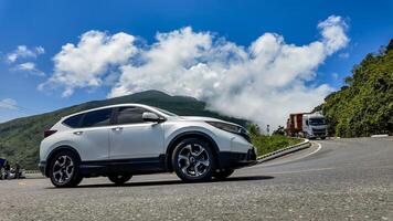 Modern SUV Journey on Scenic Mountain Route photo