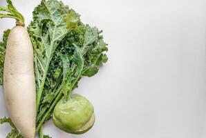 Fresh Kale, Daikon, Kohlrabi   Healthy Vegetarian Concept photo