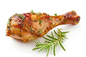 AI generated A juicy roasted chicken drumstick garnished with herbs, isolated on a white background photo