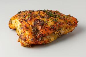 AI generated A delicious herb crusted chicken thigh isolated on a gradient background photo