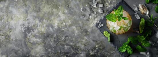 AI generated Overhead view of a Mint Julep cocktail surrounded by fresh mint sprigs and a stirring spoon on a slate coaster, featuring a neutral background with empty space for text photo