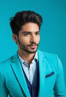 AI generated Elegant South Asian man in stylish turquoise suit posing against a teal background, ideal for fashion, business professionals, and Diwali celebrations themes photo