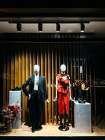 Tivat, Montenegro - 25 december 2022. Shop window with classic women and men clothing photo