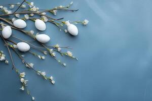 AI Generated Flat lay Easter composition with a willow branch and eggs on a blue background photo