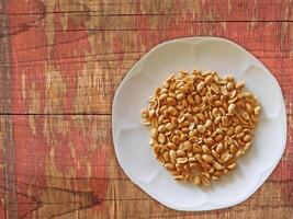 Peanuts On Wooden Background photo