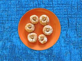 Cookies On The Wooden Background photo