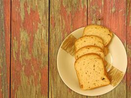 Bread On Wooden Background photo