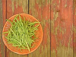 Green Bean Vegetable On Wooden Background photo