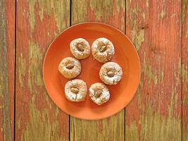 Cookies On The Wooden Background photo