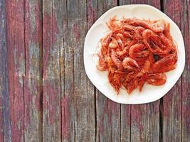 Shrimp On Wooden Background photo