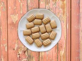 Cookies On The Wooden Background photo