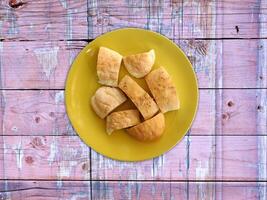 Bread On Wooden Background photo