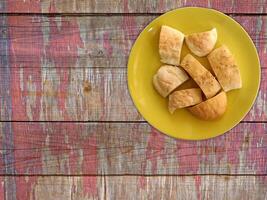 Bread On Wooden Background photo