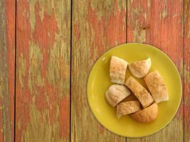 Bread On Wooden Background photo