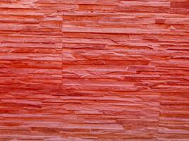 textura de piedra roja en el jardín foto