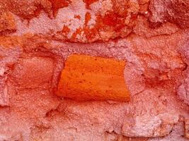 textura de piedra roja en el jardín foto