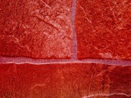 textura de piedra roja en el jardín foto