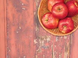 Apples On The Wooden Background photo