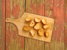 Bread On Wooden Background photo